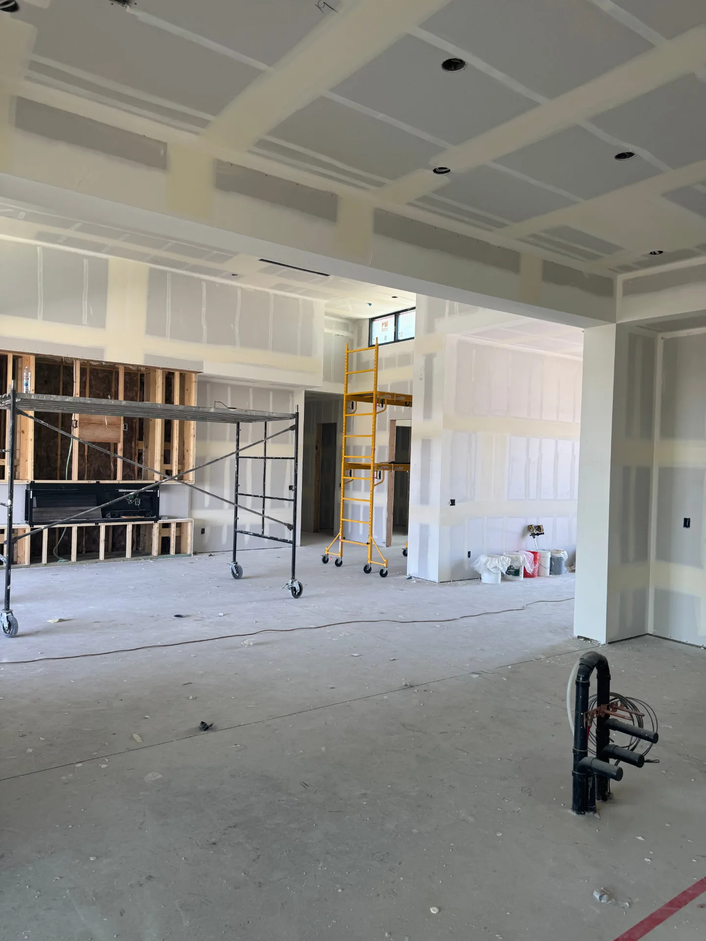 Large residential interior with drywall hung and taped by Desert Vista Drywall