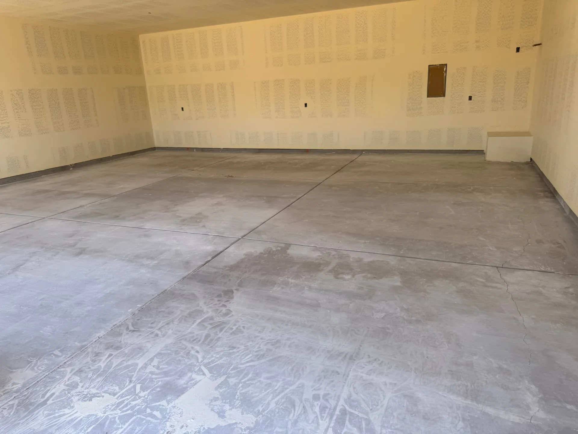 Interior wall surface taped and sanded smooth after drywall repair work